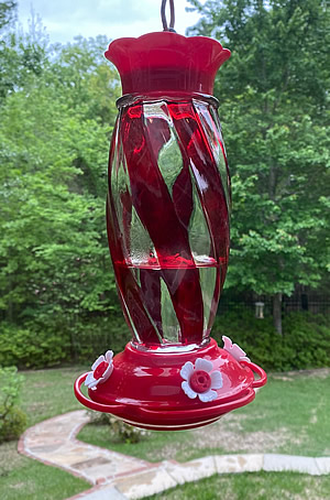 We always leave room for fancier, glass hummingbird feeders to provide some variety in the landscape!